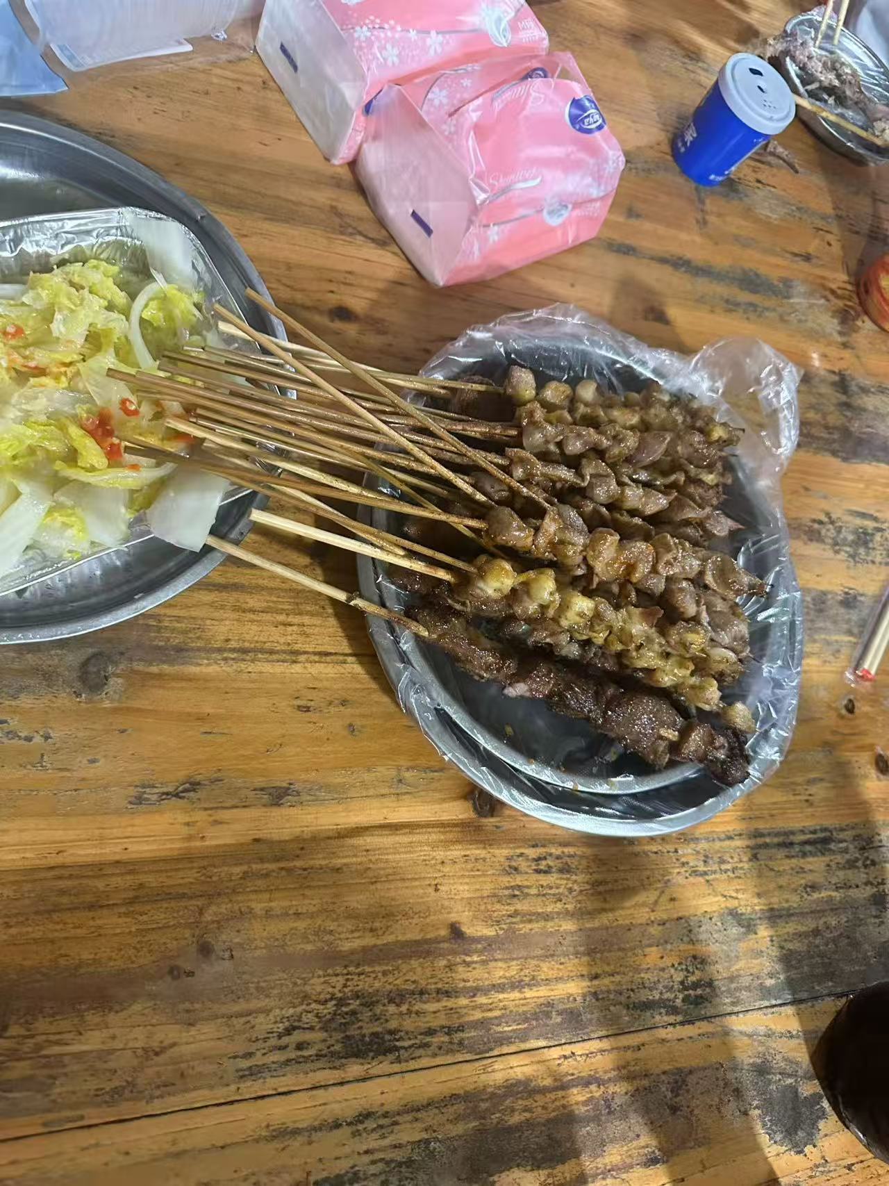 Grilled skewers and cabbage at a local restaurant.