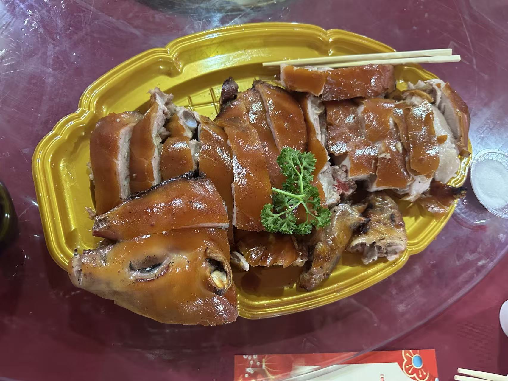 Roasted suckling pig at a family celebration.